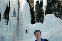 12 Jerome Ryan With Frozen Upper Falls Behind In Johnston Canyon In Winter.jpg